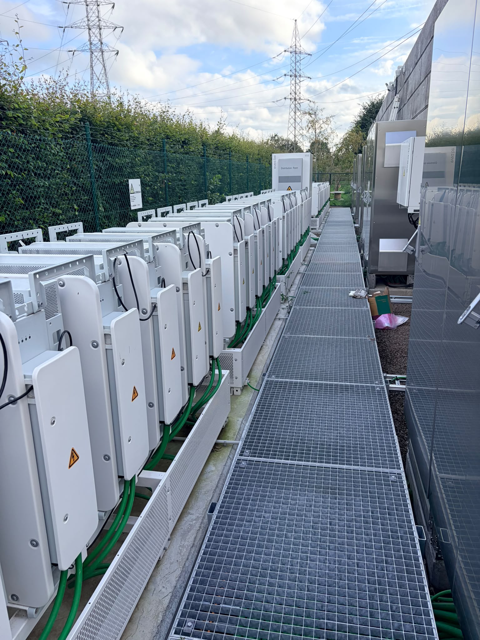 Power converters along the service walkway at the Voltaq battery park